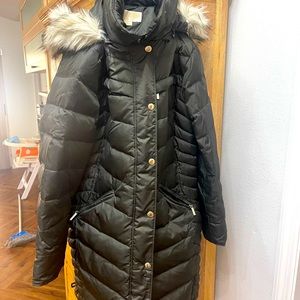 Michael Kohrs dark olive coat